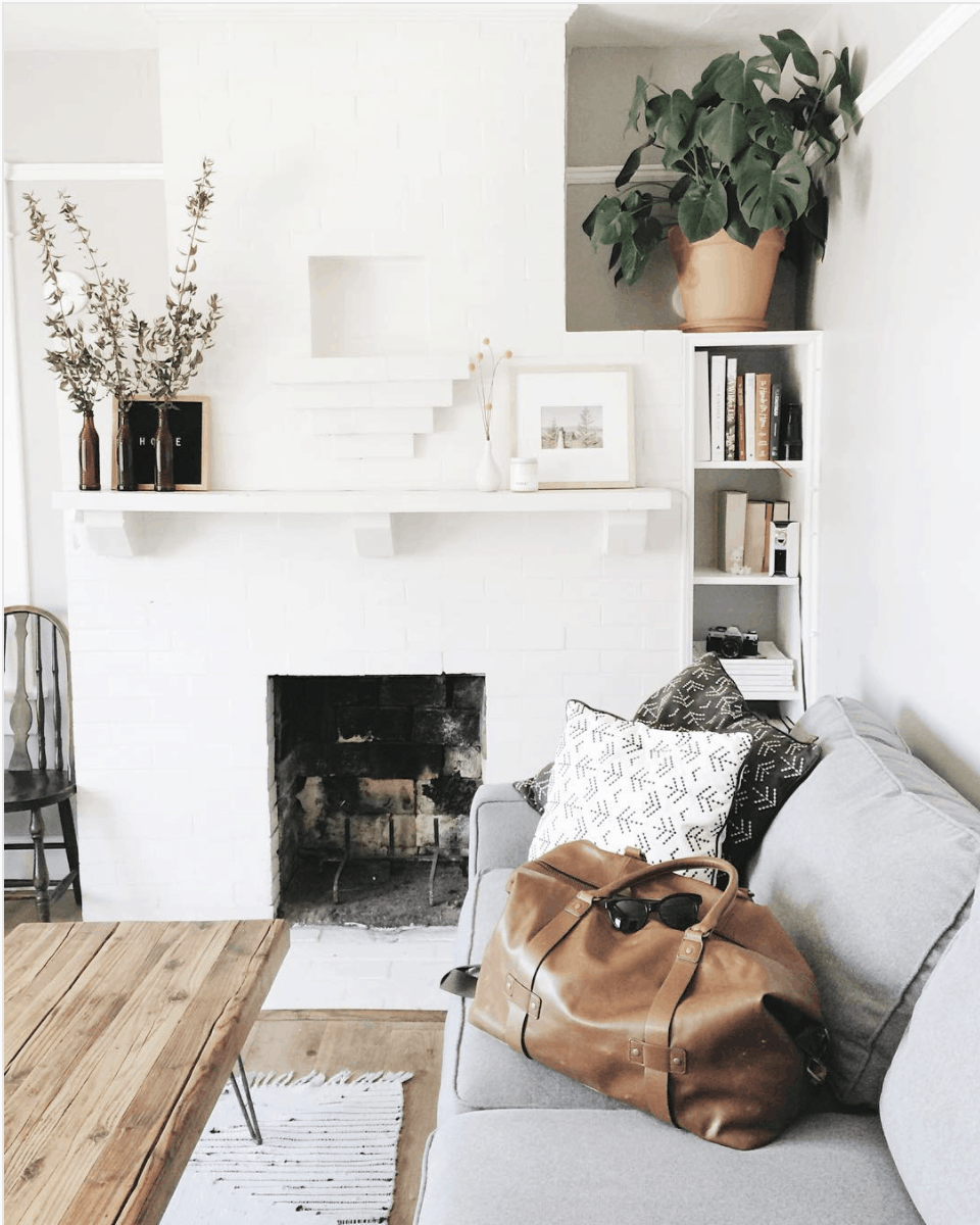 Meagan Floris - painted brick fireplace surround