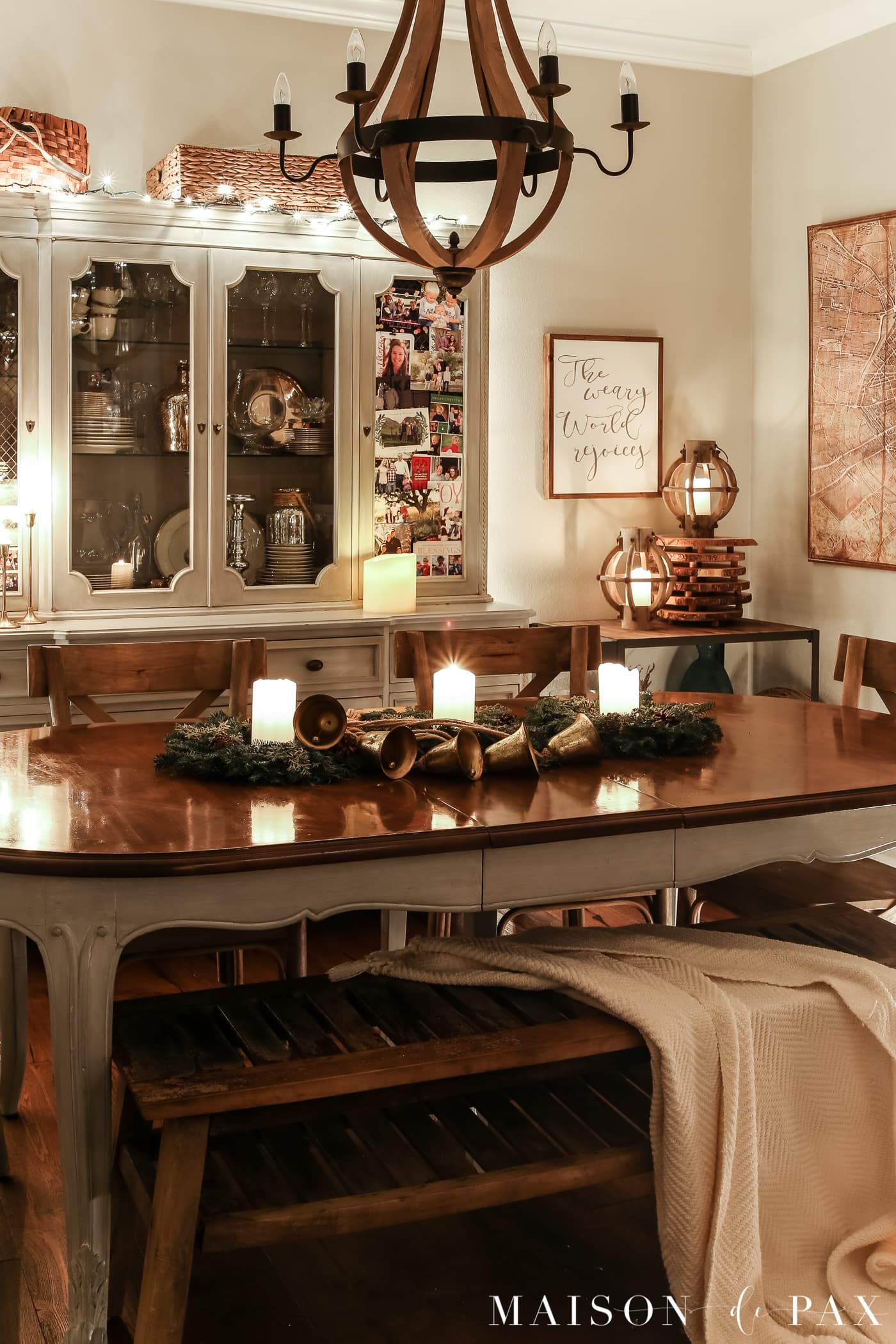 french farmhouse dining table with simple natural centerpiece: gorgeous Christmas lights at night in these 25+ home tours #christmasnightstour #holidayhometour #christmaslights
