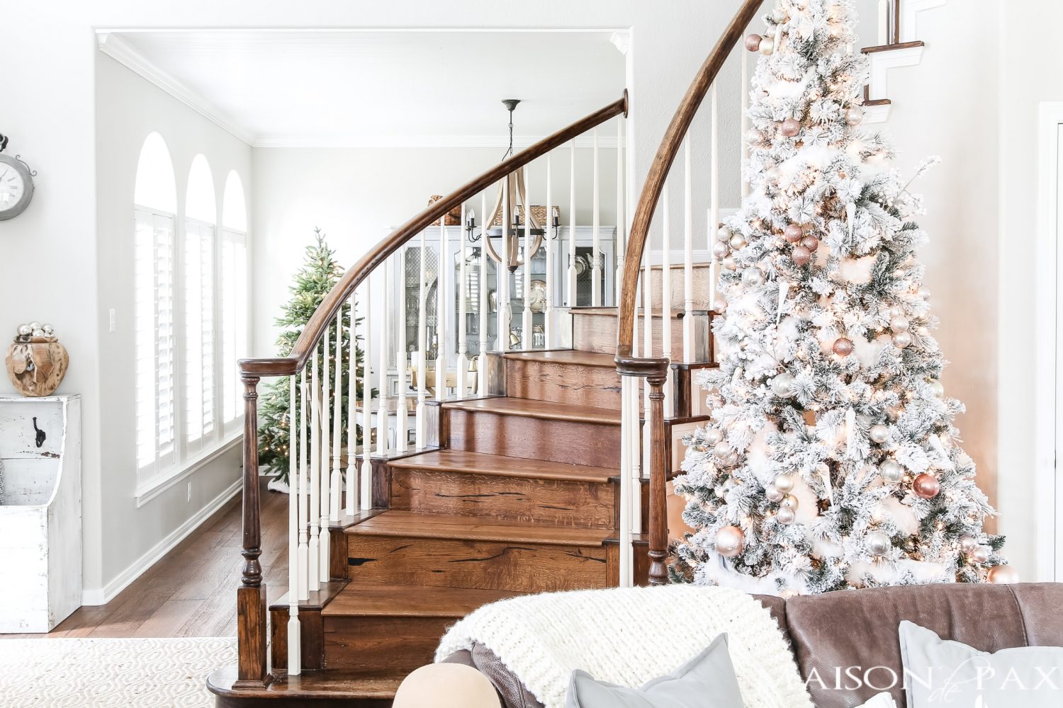 light, bright holiday home: flocked tree and blush copper decorations #christmastree