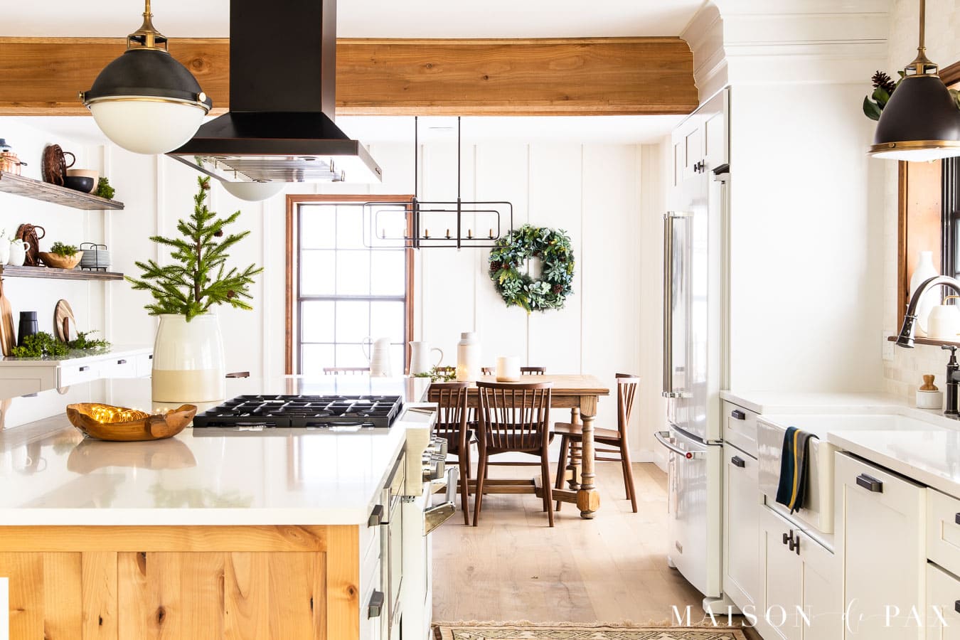 white and wood kitchen with holiday greenery | Maison de Pax