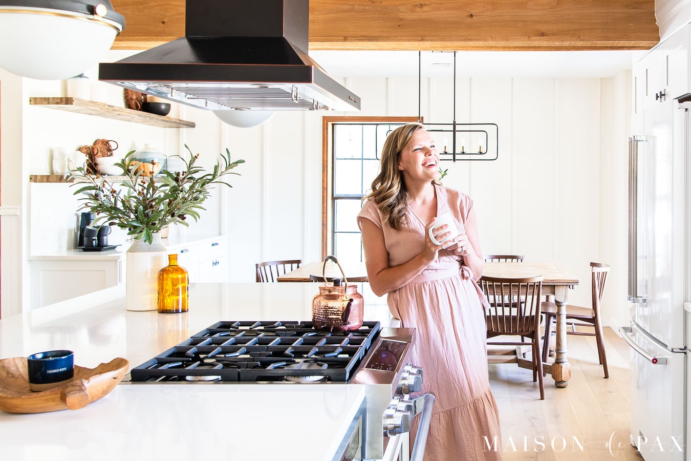 woman laughing in modern farmhouse kitchen | Maison de Pax