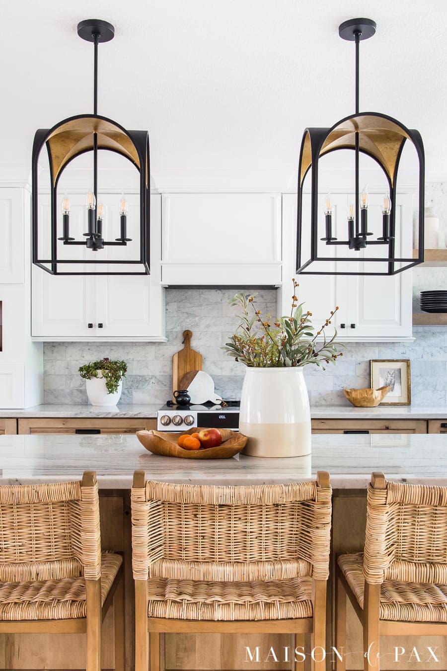 white and wood kitchen with black and gold island pendant lights | Maison de Pax