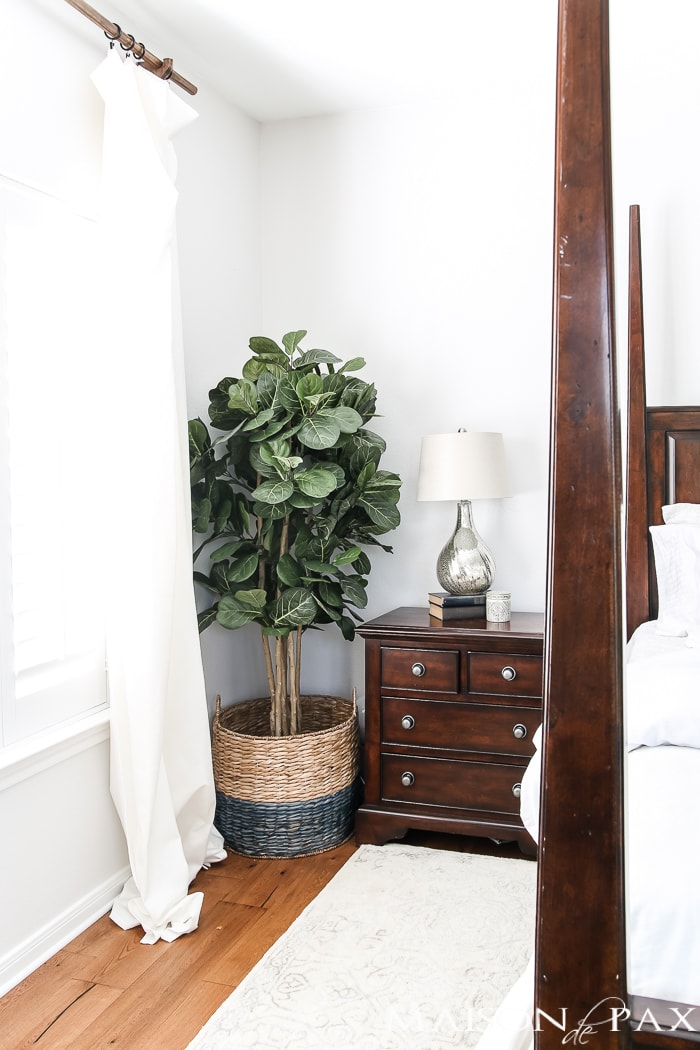 Relaxed, natural, neutral master bedroom with lots of white and touches of boho texture... the perfect retreat!