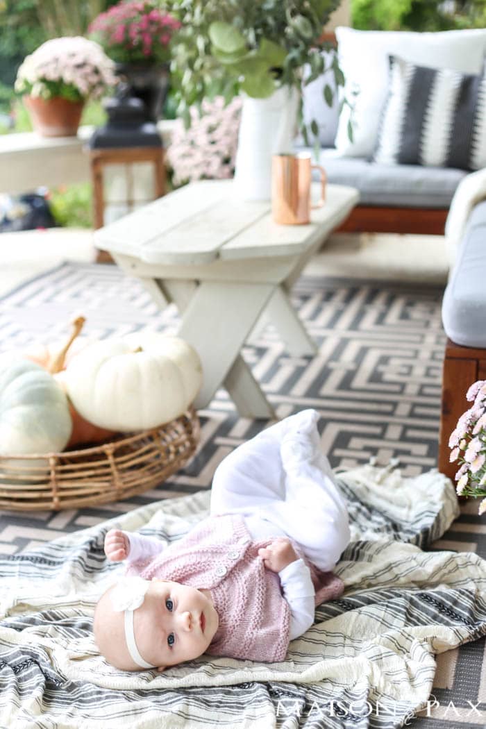 pastel pumpkins and fresh eucalyptus make this gorgeous outdoor living space ready for fall- Maison de Pax