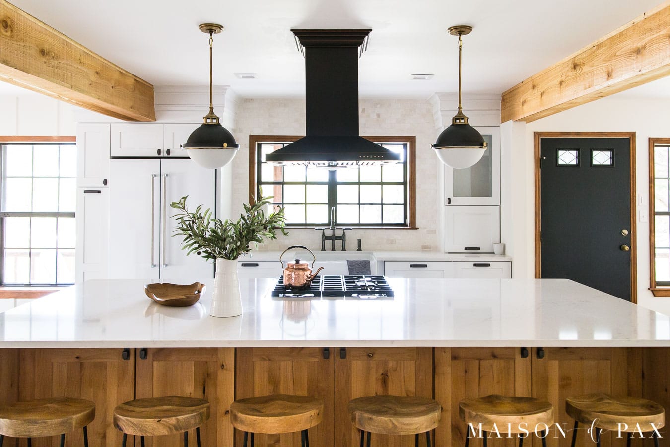 big wood island kitchen black and white lighting | Maison de Pax