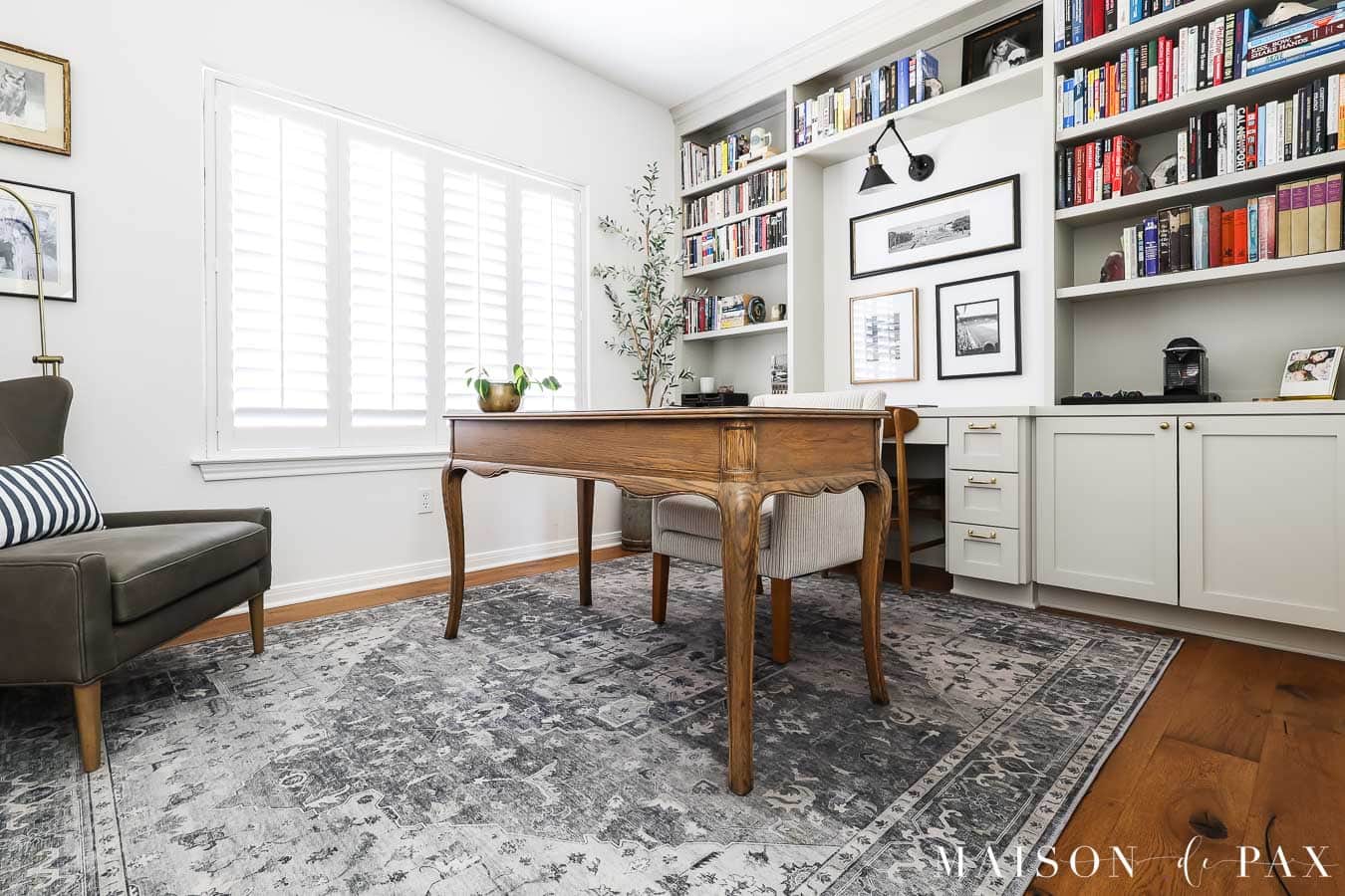 home office with oak desk and built in bookcases