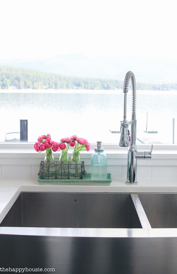 A Happy Kitchen: such a gorgeous aqua and white kitchen with beautiful, white counters and many diy elements
