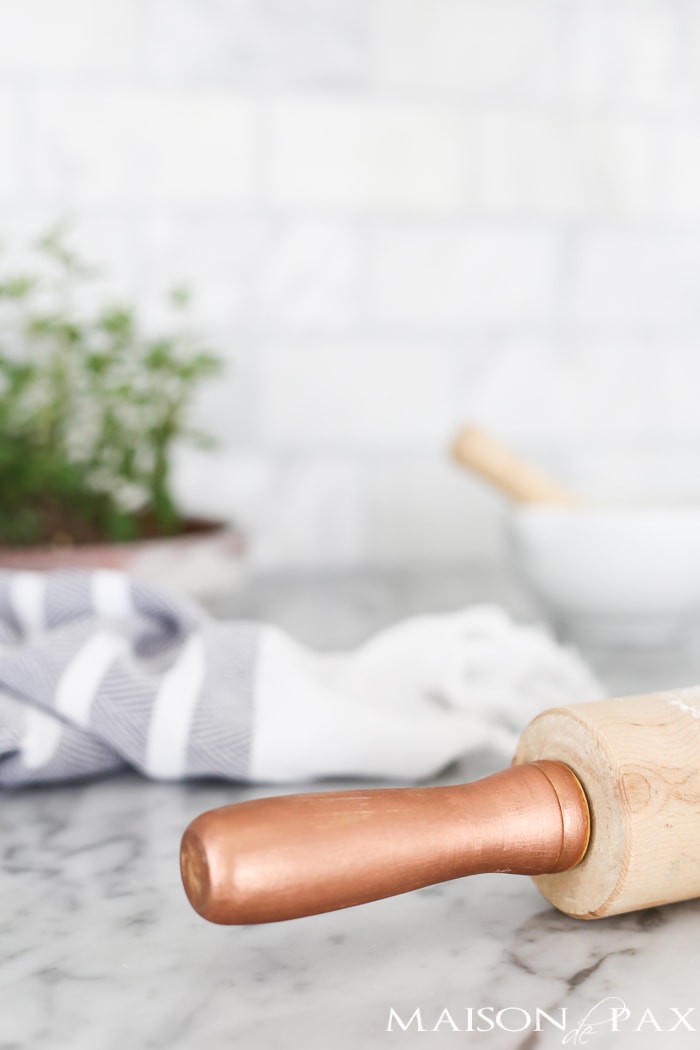 Close-up of a copper painted wooden rolling pin- Maison de Pax
