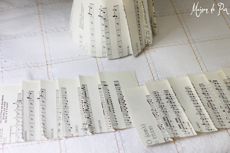folding sheet music to make christmas trees