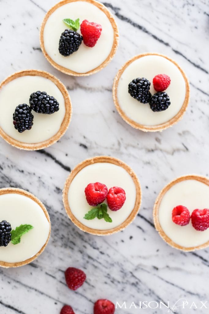 Mini lemon lime tarts topped with fresh berries- Maison de Pax