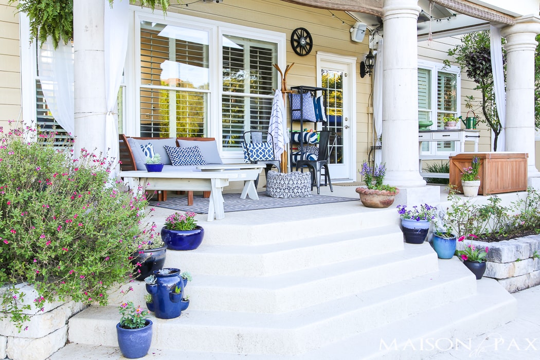 Painted porch with planters and outdoor furniture- Maison de Pax