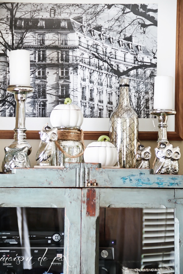 Vintage painted bookshelf with pumpkins, candlesticks, and owls- Maison de Pax