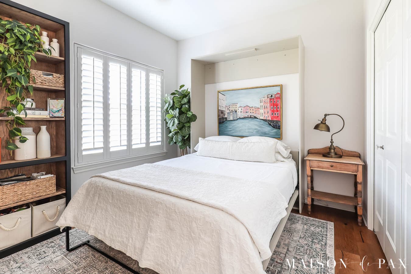 office and guest room combo with murphy bed and hidden artwork