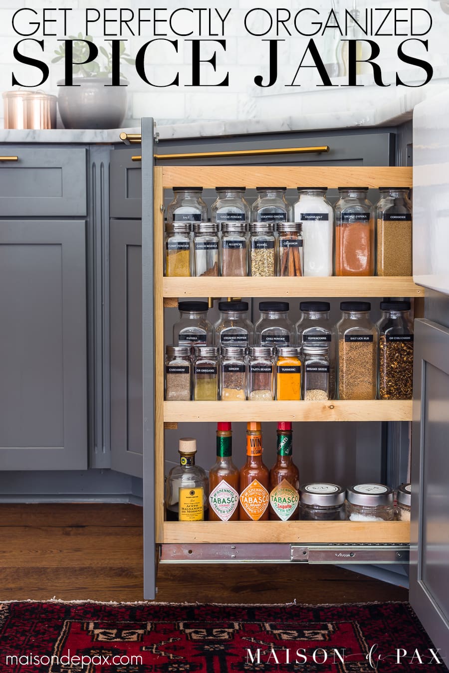 Love organized spices? Find out where to get supplies to organize your spices just like this! #spiceorganizer #spiceorganization #spicecabinet #spicepullout #kitchenorganization #spiceorganizer #organize #organization