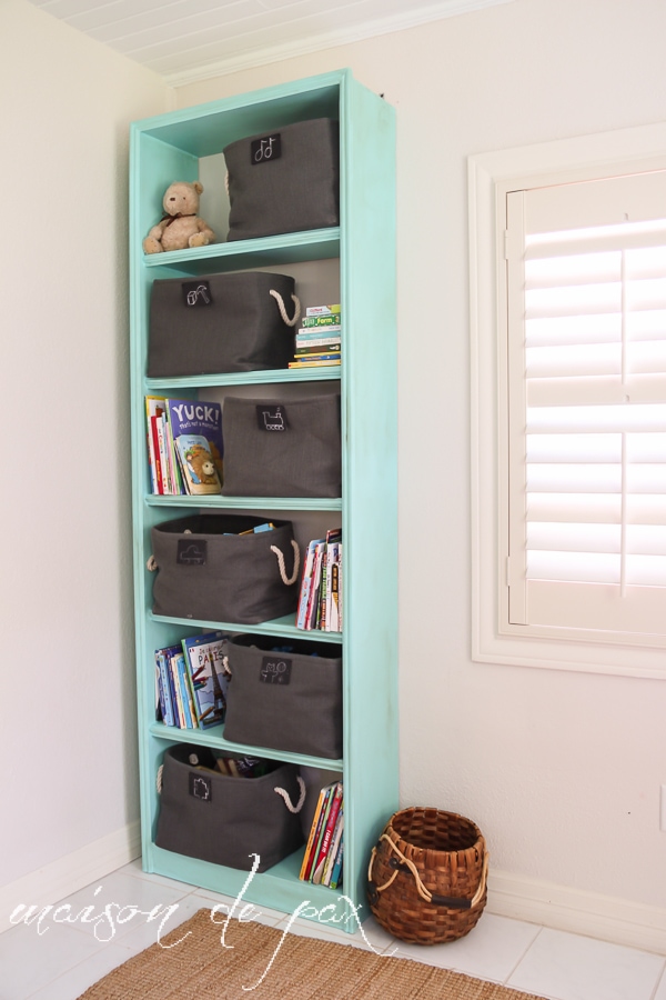 Fabulous "vintage aqua" bookcase makeover for adorable and functional playroom storage at aiweb9ygdry.cmersite.com #makeover #furniture #paint #diy #tutorial #chalkpaint