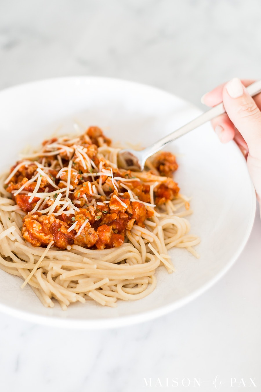 spaghetti with meat sauce topped with parmesan cheese | Maison de Pax
