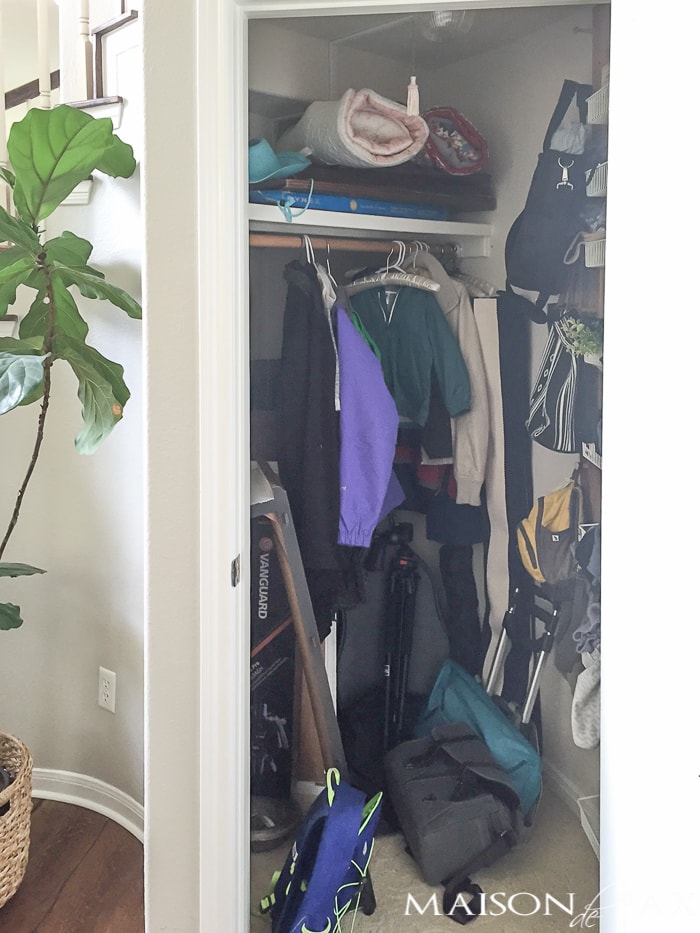This is the "before"... you won't believe the after! This closet is turned into a mini mudroom with some clever storage