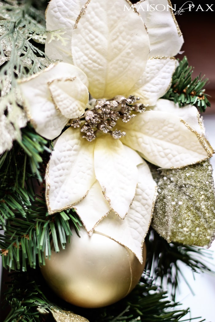 I love this simple, white and green look for the holidays! Classic greenery and white accents for a Christmas Front Porch | aiweb9ygdry.cmersite.com