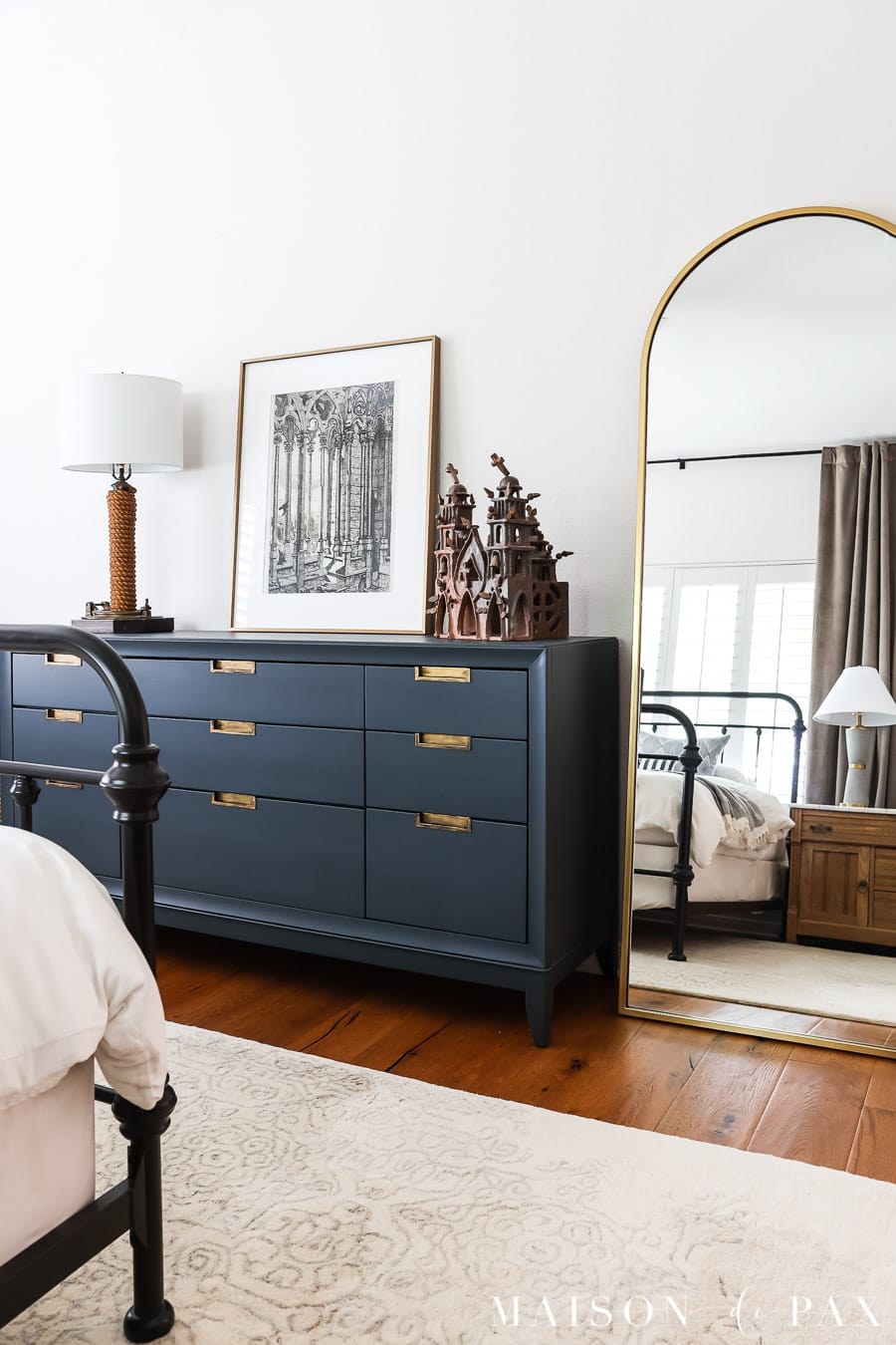 dark blue dresser in master bedroom