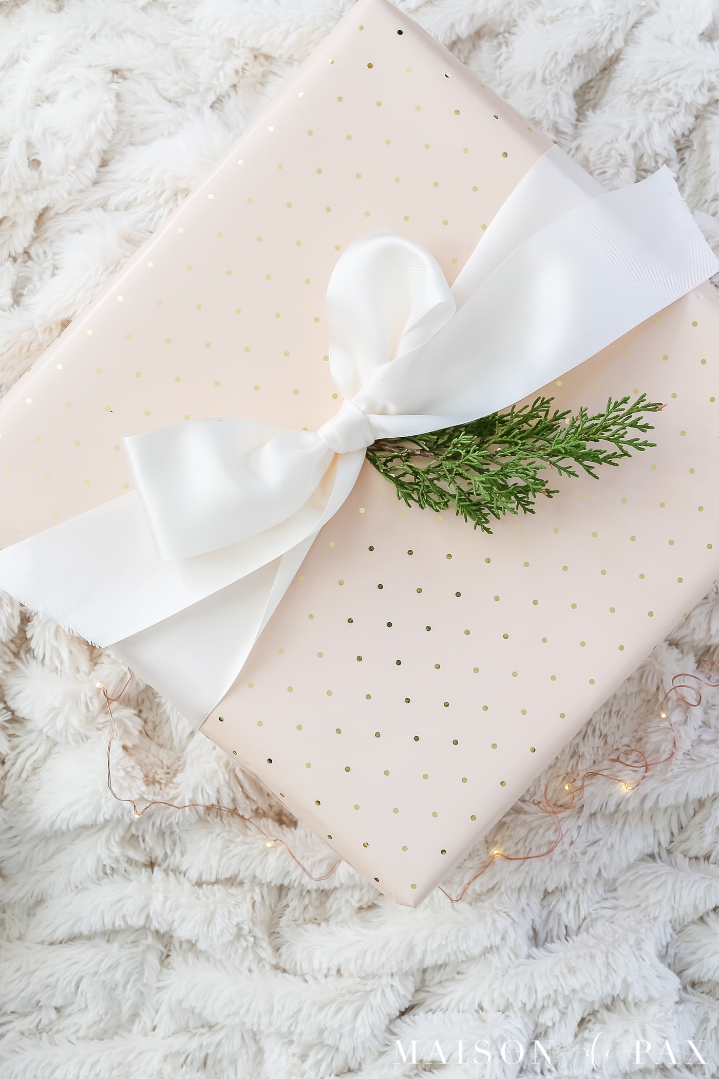 easy gift wrapping ideas: a giant satin ribbon makes a big statement #christmaspresents #giftwrap