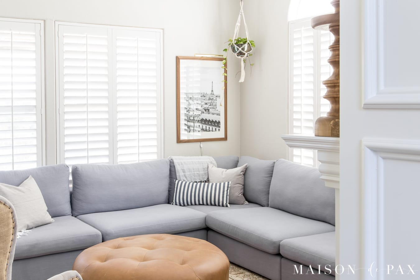 Tips for decorating around a sectional! #sectionalsofa #modularsofa #livingroomdecor #livingroomdesign #rusticmodern #lightgraysectional #graysectional #neutrallivingroom