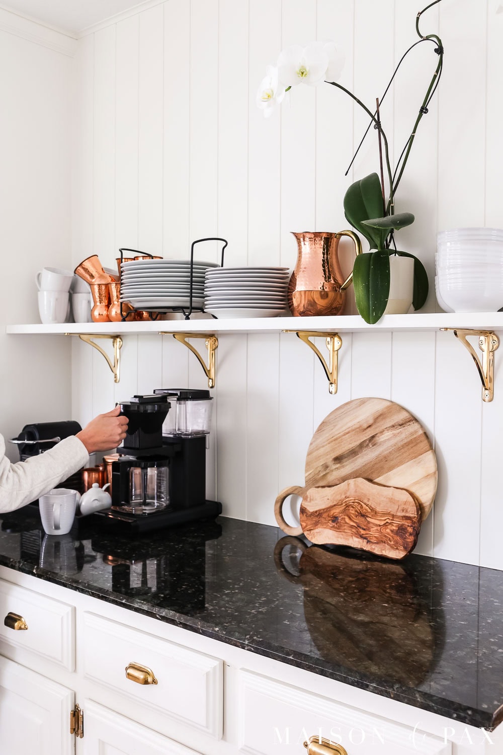 coffee bar area with open shelf above in kitchen