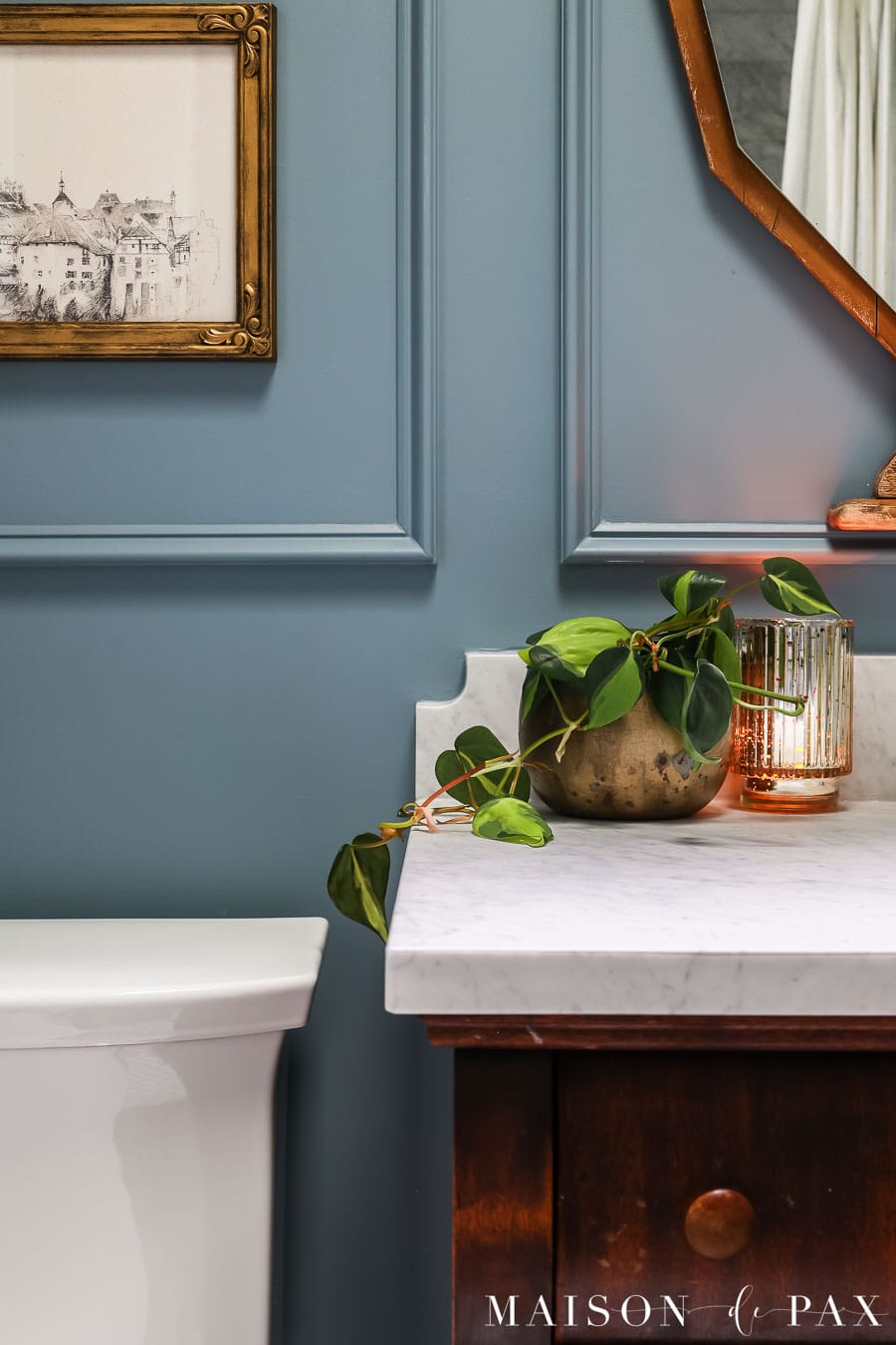 a beautiful gray blue color in a small bathroom