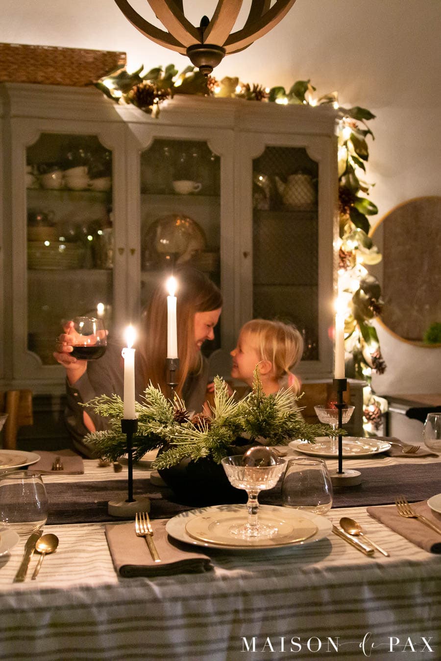 mother and daughter enjoying Christmas dinner