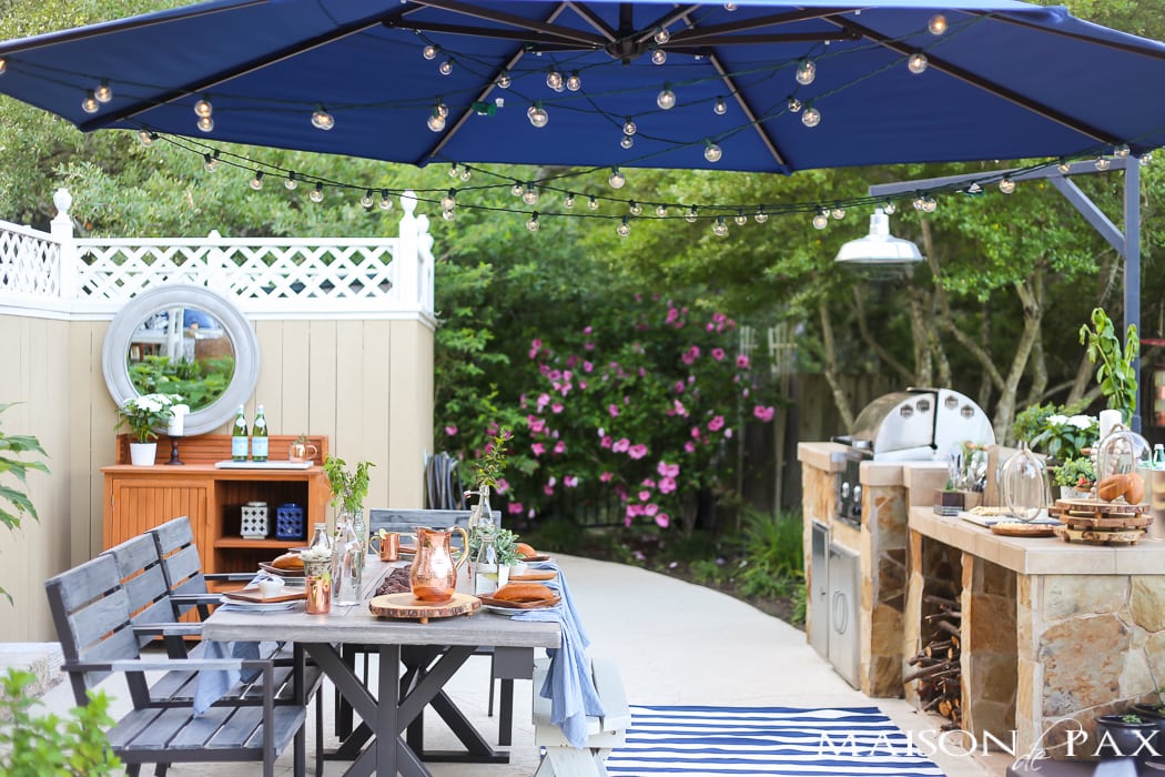 Outdoor Decorating Tips: make your outdoor dining space usable with a giant shade umbrella