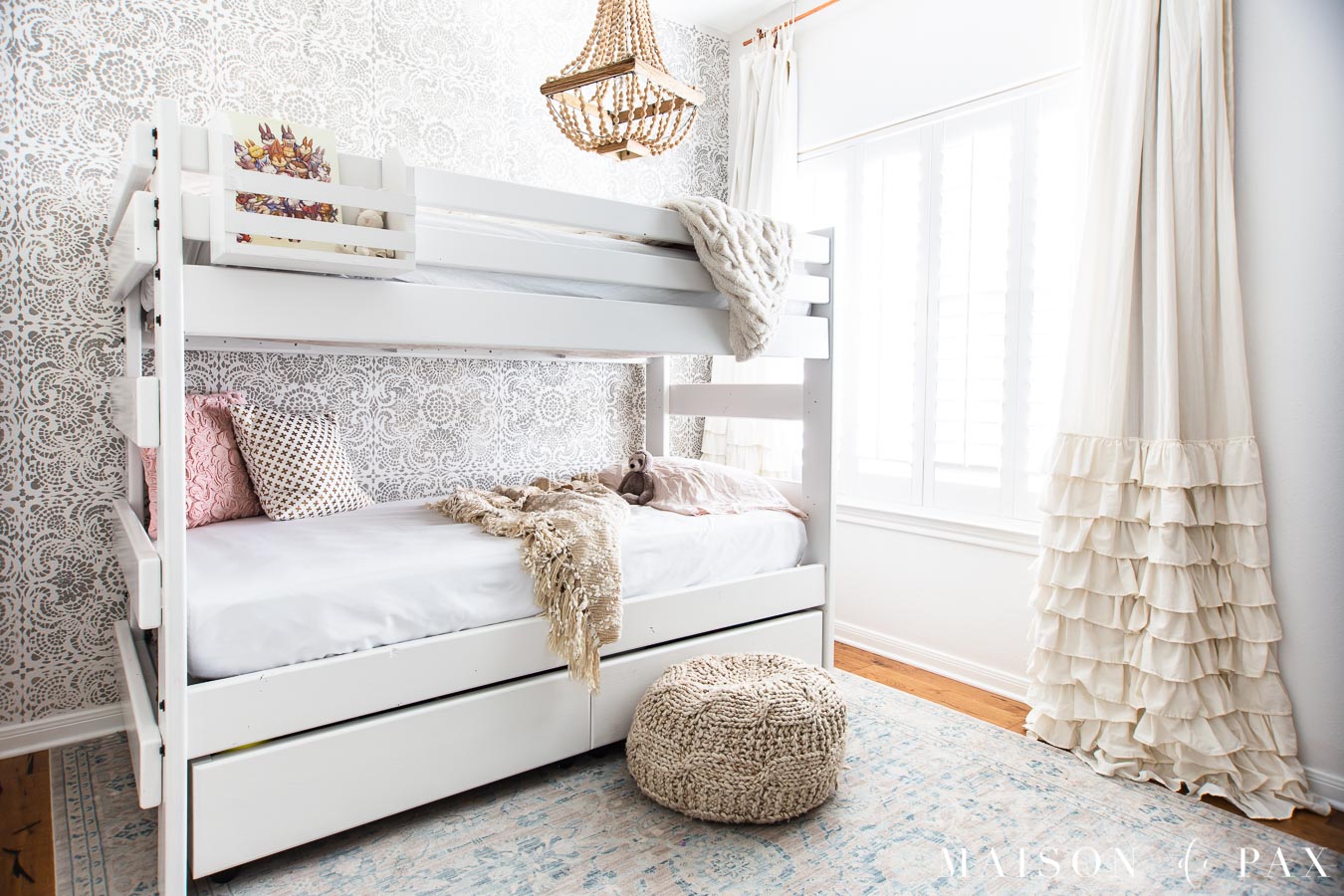 girl's room with white bunk bed, stenciled wall, ruffled curtians | Maison de Pax
