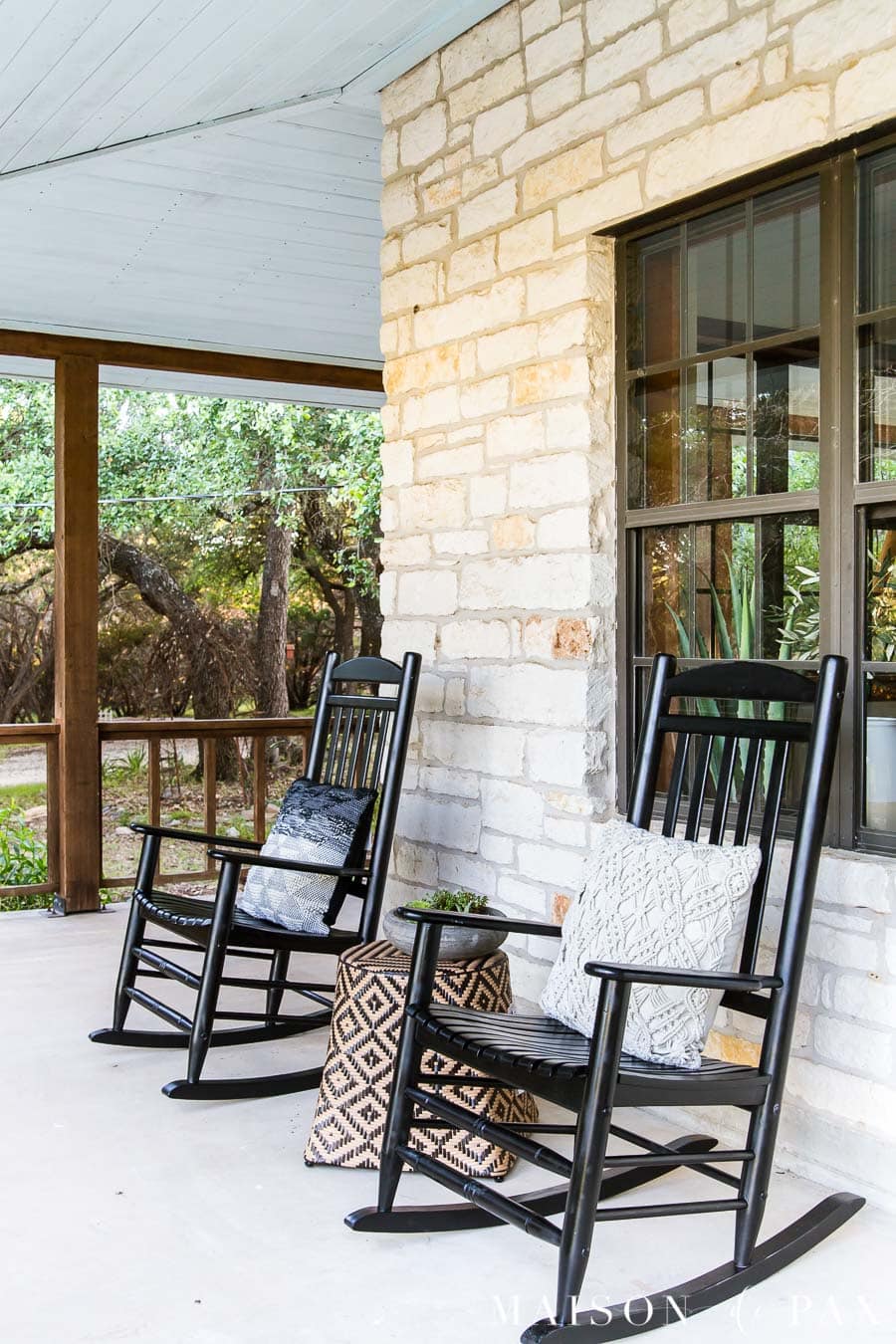 black wooden rocking chairs on Austin stone front porch | Maison de Pax