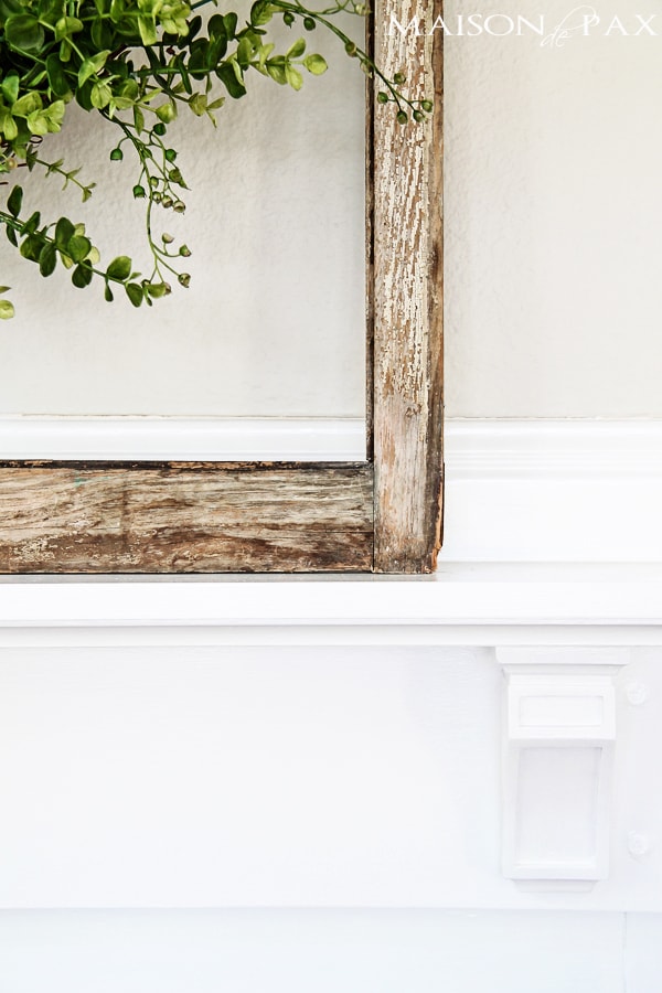 I love how this simple diy mantel changes the fireplace! Find out how to build a simple fireplace mantel (or faux fireplace shelf!) with this easy to follow tutorial | aiweb9ygdry.cmersite.com