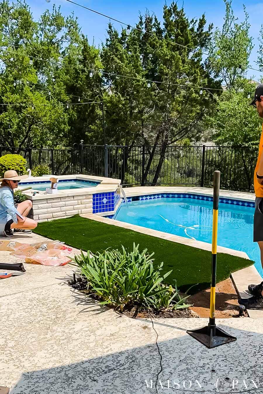 laying strip of artificial turf