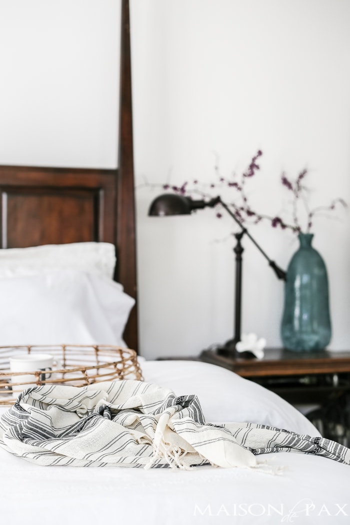 Relaxed, natural, neutral master bedroom with lots of white and touches of boho texture... the perfect retreat!