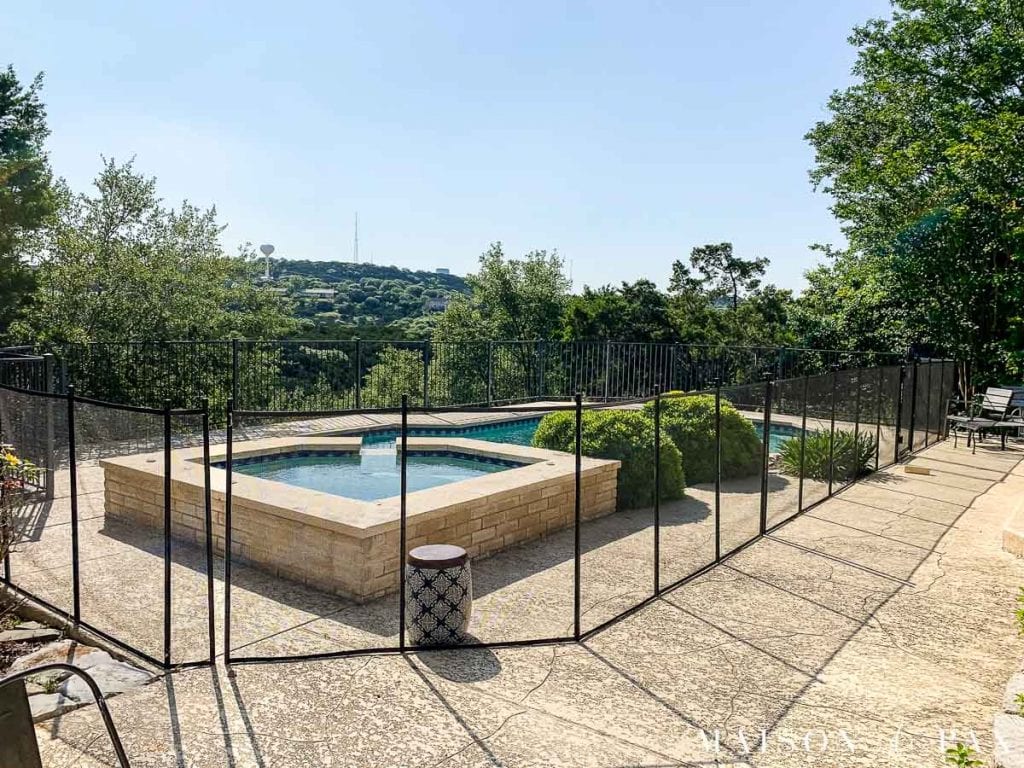 large cream colored deck and light blue pool | Maison de Pax