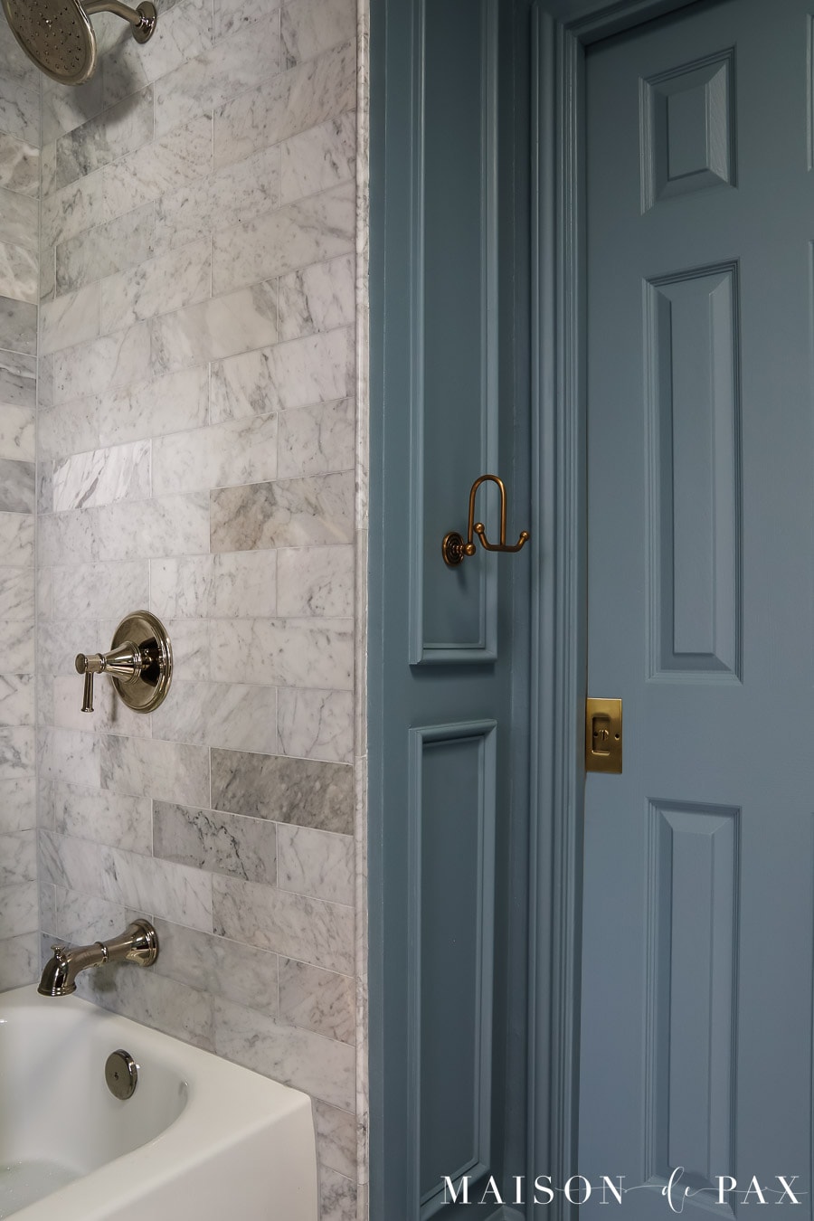 picture frame molding on a narrow wall in small bathroom