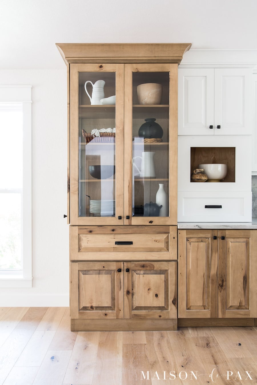 floor to ceiling decorative cabinet in kitchen