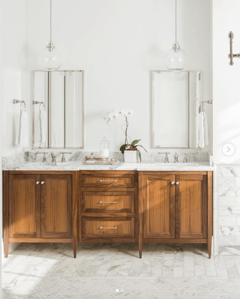 mcm wood vanity with marble countertop and tile