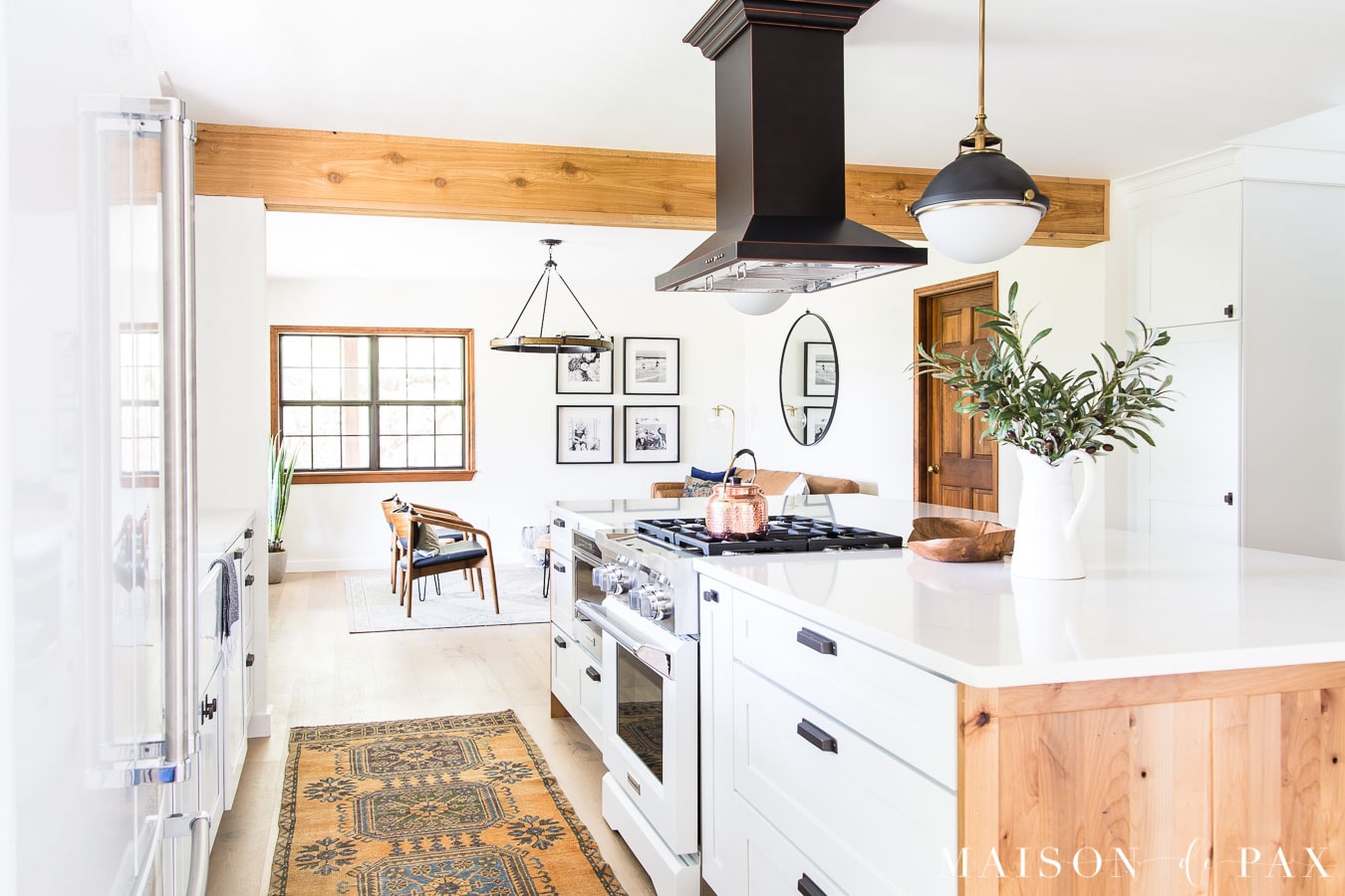 big kitchen island looking into open living room | Maison de Pax